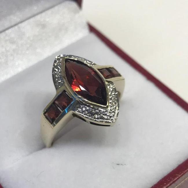 View four of 10 Karat Yellow Gold Garnet And Diamond Accent Ring