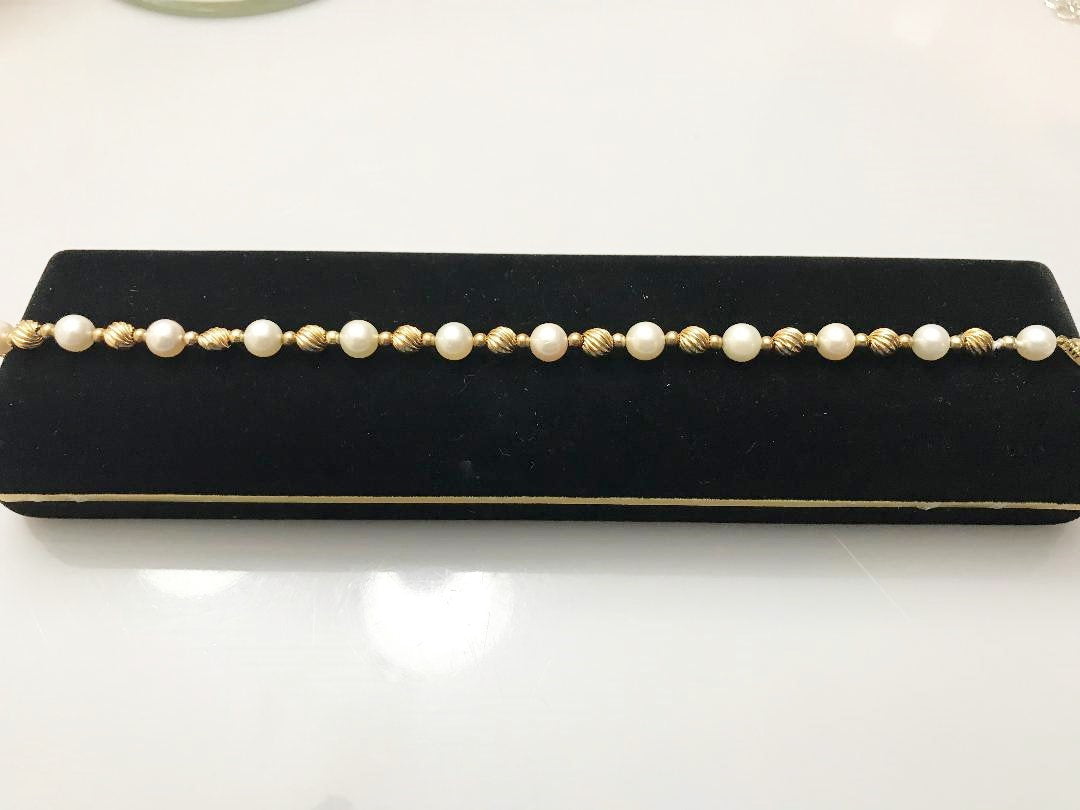 View three of 14 Karat Solid Yellow Gold Corrugated Ball And Pearl Bracelet 8" Long