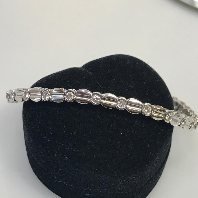 Ladies white gold and diamond tennis bracelet